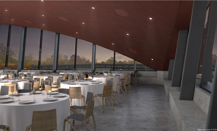 Indoor reception at Winter Park Events Center with round tables, minimalist decor, and large glass windows at dusk